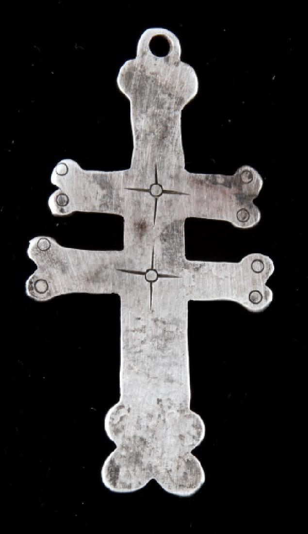 ANTIQUE NATIVE AMERICAN FUR TRADE SILVER CROSS: Silver two-barred Cross of Lorraine from the fur trade with Native Americans, 2 inches in length. There are no visible maker's marks or hallmarks. Ex. John Montague Collection