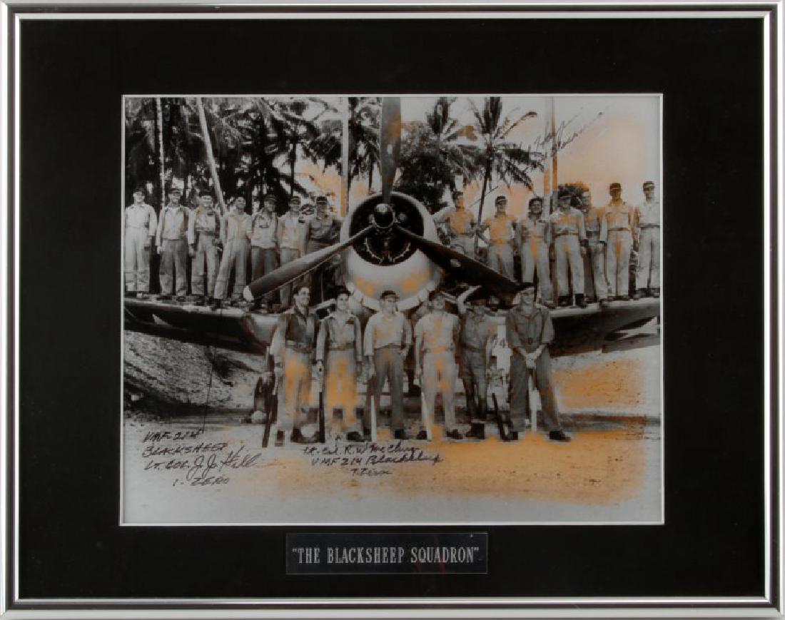 BLACK SHEEP SQUADRON AUTOGRAPHED PHOTO SIGNED BY 3: Framed and matted photo of "The Black Sheep Squadron" signed by Lt. Col. J.J. Hill (1 zero), Col. Edwin A. Harper, and Lt. Col. R.W. McClurg (7 zeros). Photo has age wear and foxing, but autographs ar