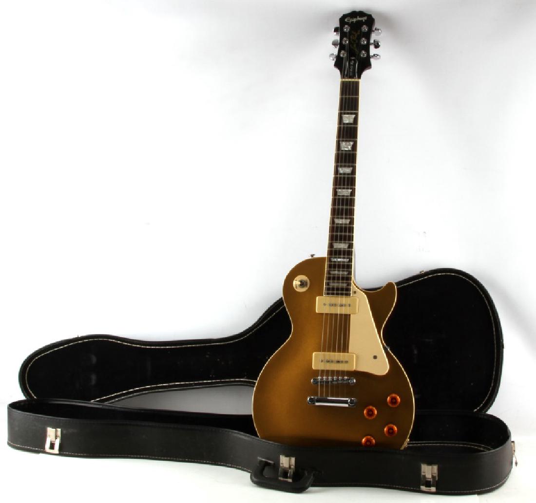 56 GOLD TOP LES PAUL MODEL EPIPHONE IN CASE LTD ED: Epiphone Les Paul '56 Gold Top 2006 "Special Limited Edition" #EE06062115 electric guitar. Beautiful finish. Very good condition. Comes with hard shell plush case.