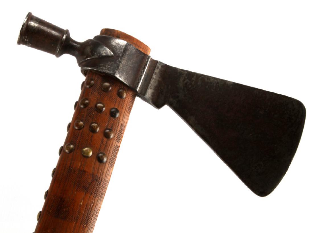 ANTIQUE NATIVE AMERICAN FUR TRADE PIPE TOMAHAWK: Pipe tomahawk from the fur trade with Native Americans. In good condition, though the head has become loose on the haft and slides somewhat freely. The handle is decorated with rows of brass tacks. Me