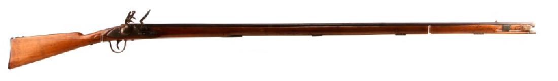 EARLY INDIAN TRADE FLINTLOCK RIFLE MUSKET .59 CAL: Features a 51 inch octagon to round barrel, full wood stock, iron furniture, and ramrod. Some holes in wood, butt seems to be added later, two crossed marks and number 22 marked to left barrel flat. B