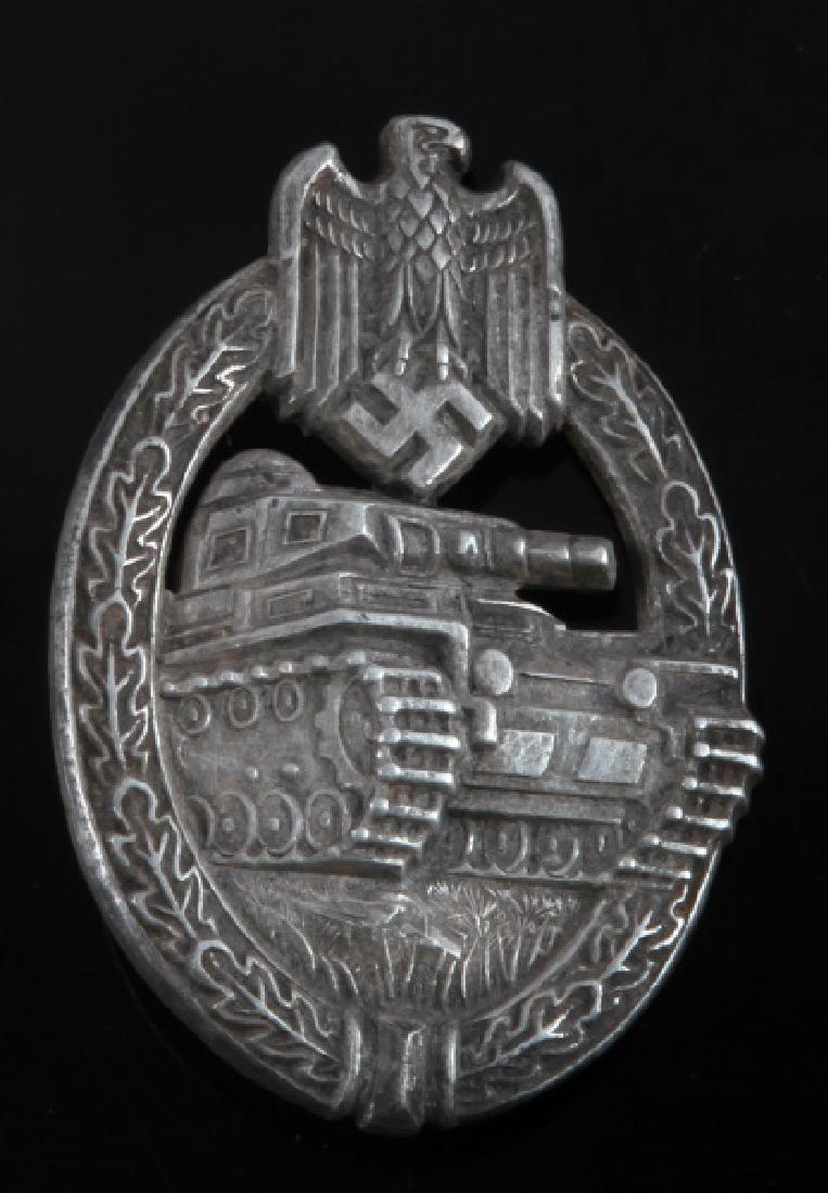 WWII GERMAN 3RD REICH SILVER PANZER ASSAULT BADGE: Silver Panzer Assault Badge. In very good condition.'DH' maker mark stamped under the 'T' pin.