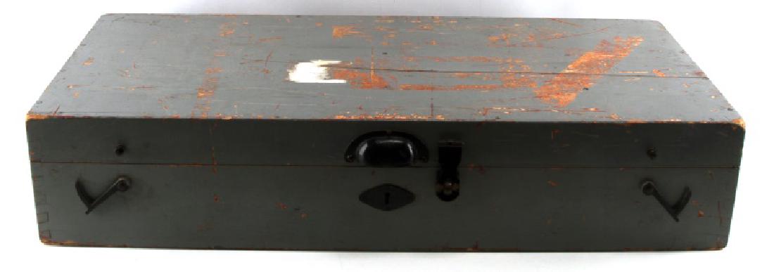 WWII JAPANESE BIG EYE BINOCULAR BOX AND STAND: The wooden case and 3 legged extendable stand for a set of Japanese big eye binoculars. Case is in good condition with some wear to the grey paint on the outside. Measures roughly 32 x 14 1/2 x 7 inch