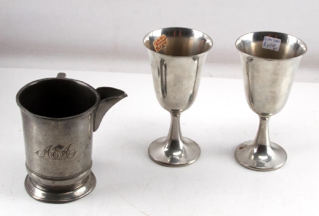 EARLY PEWTER MATCHING GOBLETS AND PINT MUG PITCHER: Lot includes: two shiny goblets (6 5/8 inches tall) by Boardman, and one pint monogrammed mug/pitcher with crown, VR, 67 mark right next to "pint" and engraving to bottom (5 inches tall). Very good co