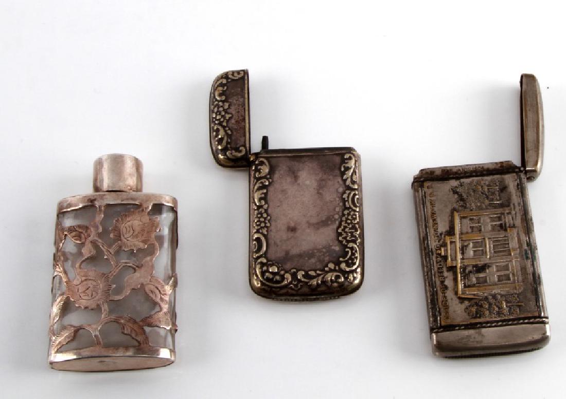 MIXED LOT SILVER MATCH BOX SNUFF BOTTLE & REED BOX: Three items: glass snuff bottle with floral silver overlay and screw-on top, marked Mexico 925 to bottom (just under 3 inches tall), silver match box with leaf design, marked silver to inside rim (2 5