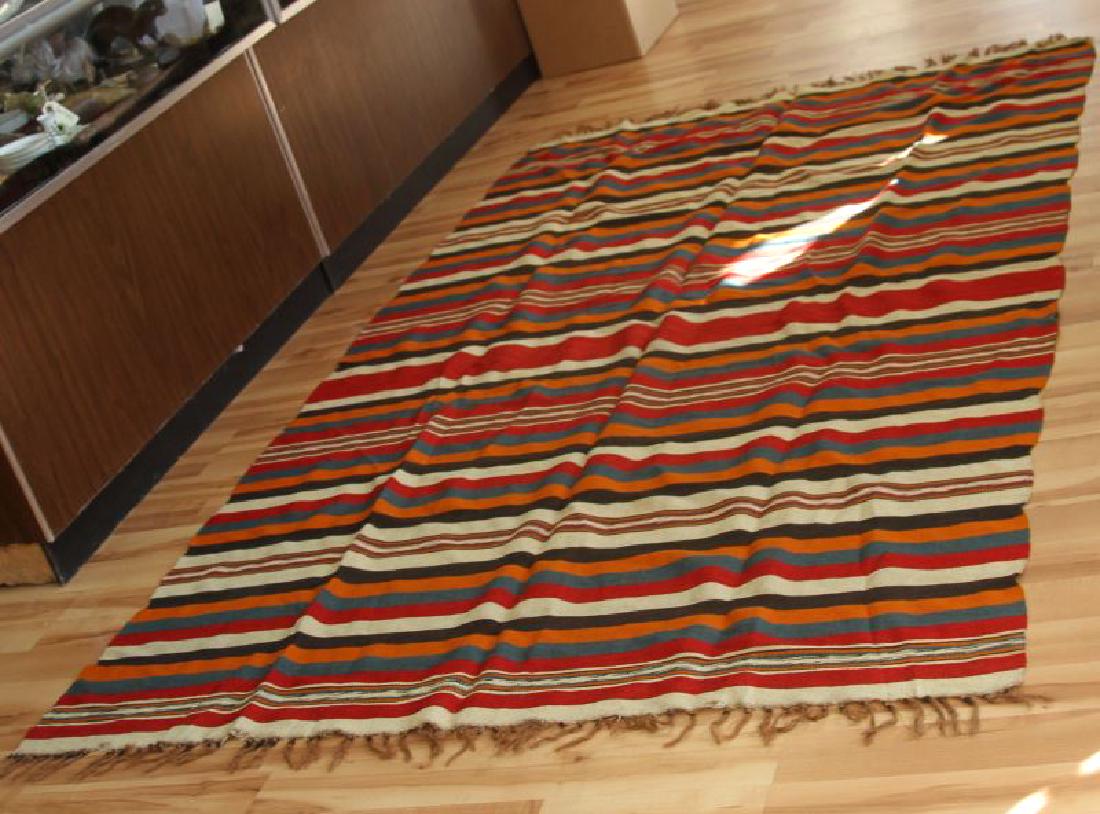 VINTAGE NATIVE AMERICAN SERAPE SHOULDER BLANKET: Light weight Serape is in very good condition. No loss of weave/tread, few small spots discoloration. Please reference photos for condition. Measurements are 105 by 60 inches.