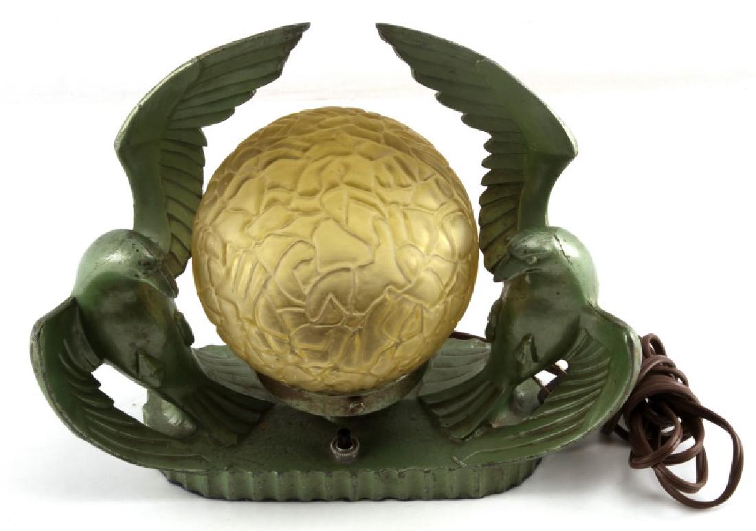 ANTIQUE ART DECO DOVES DESK TABLE GLOBE LAMP: 1920-1949 Art Deco lamp green doves with original globe. Measurements are 9x11x6 inches, some loss of paint and scratches noted throughout. Please reference pictures for condition.