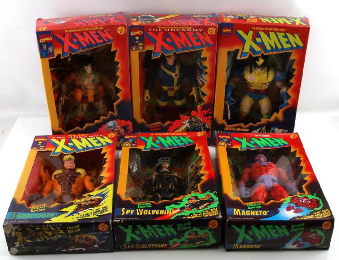6 BRAND NEW IN BOX X MEN ACTION FIGURES: 6 brand new in box X-Men action figures. Includes Cyclops, Wolverine, Spy Wolverine, Weapon X, Magneto, and Sabretooth. Some boxes show minimal wear but are unopened.