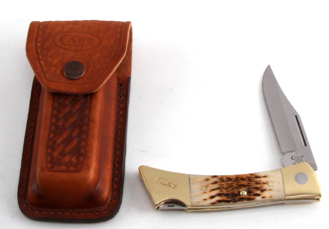 CASE POCKET CHANGER KNIFE FILLET BONING SAW DROP: Model #00050. Case XX-Changer SS. Discontinued by manufacturer. Tru-sharp surgical stainless steel blades; Hunter peach seed jigged amber bone and brass handle. Interchangeable locking clip, fillet/bo