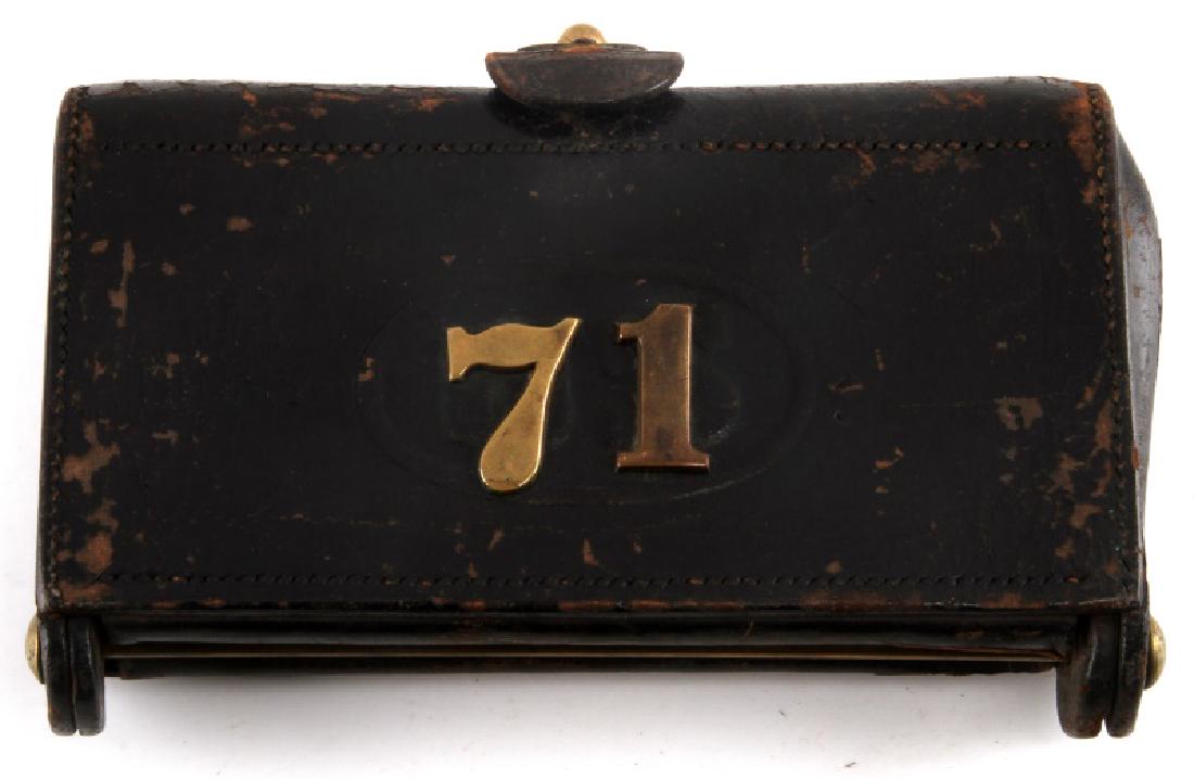 US .45 70 GOVT AMMO POUCH ANSON MILLS DEC 28 1880: Leather pouch with brass 71 to front and slots to back. One bullet inside, holds 10. General wear but intact condition. Measures 6.5 by 4 inches.