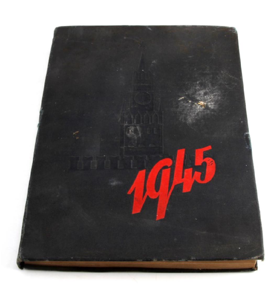 SOVIET CALENDAR 1945 WARTIME PROPAGANDA BOOK: Hardcover book with raised images on cover. Published by "The Foreign Languages Publishing House - Moscow". Contains text and photos of various Soviet figureheads, accomplishments, and more. Wear to c