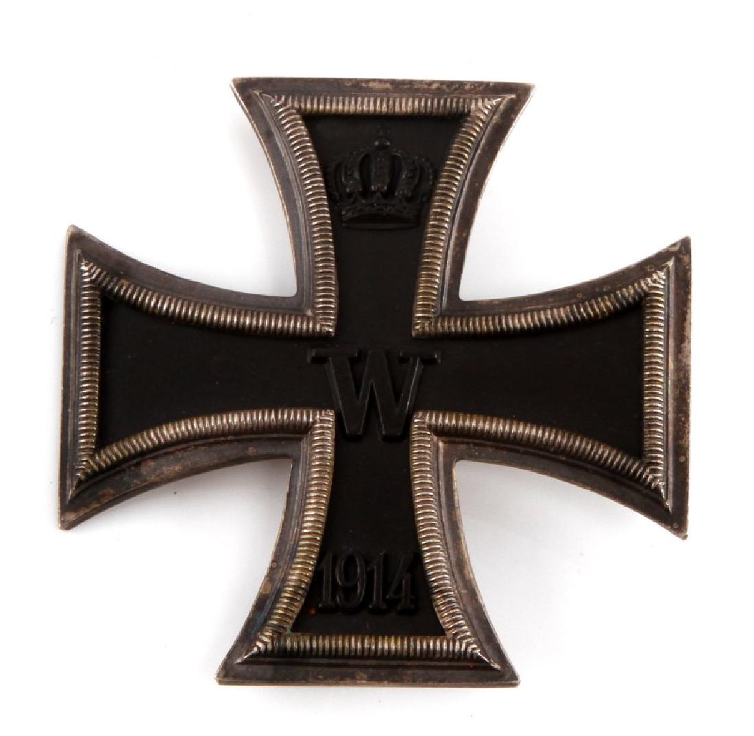 WWI GERMAN REICH IRON CROSS 1ST CLASS BADGE: In very good condition with magnetic core. Straight vertical pinback marked 800 WS(Wagner). This lot has a reserve.