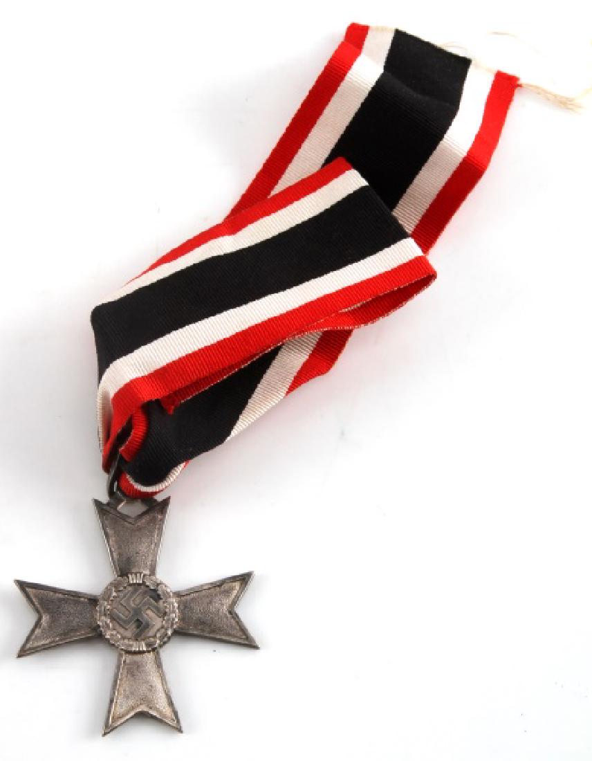 GERMAN WWII KNIGHTS CROSS TO THE WAR MERIT CROSS: German World War II Knights Cross To The War Merit Cross Without Swords. The bottom arm is marked ‘1’ for the firm of Deschler & Sohn Munchen. It is also marked ‘900’ for the silver content. I