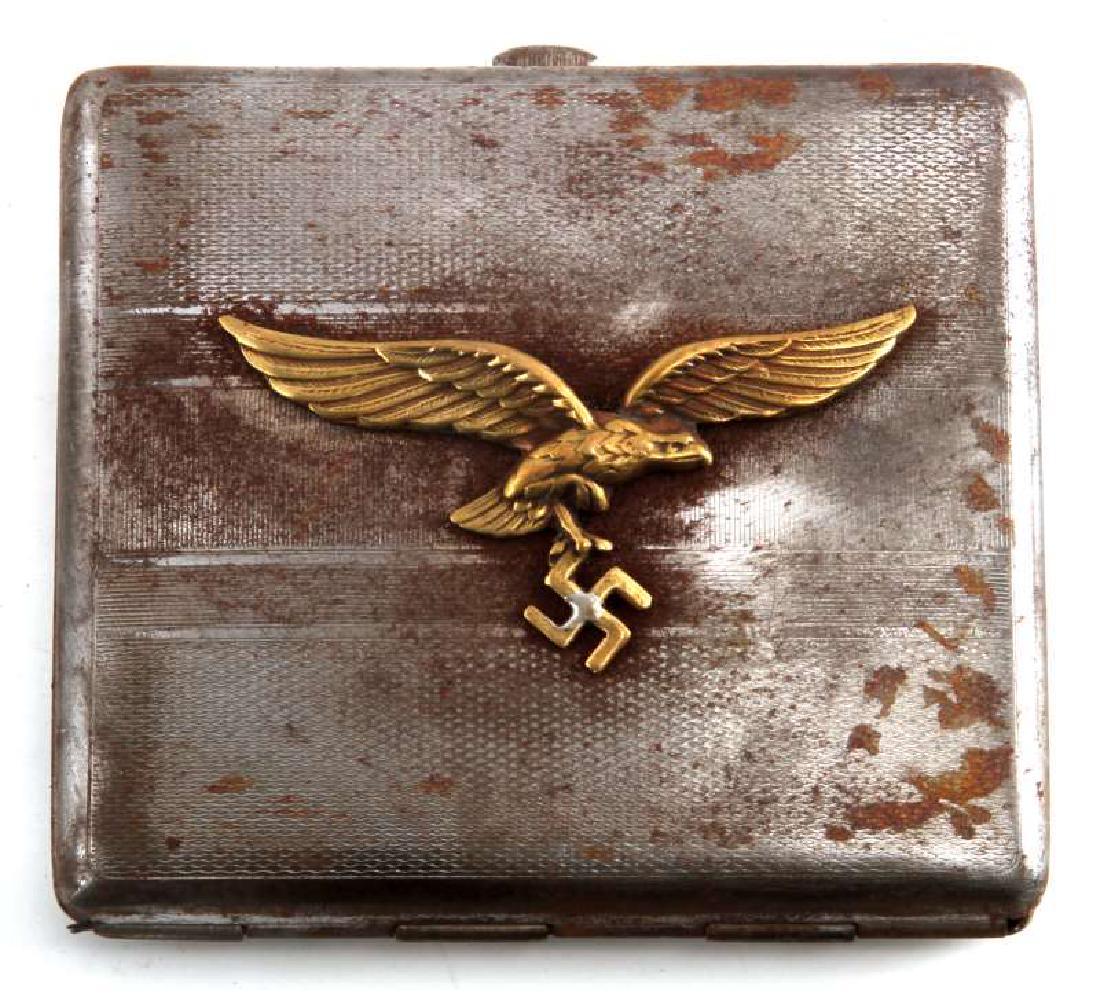 GERMAN WWII LUFTWAFFE PILOT CIGARETTE CASE: Some wear and discoloring present to case; overall in very good condition. Unauthenticated, sold as is. This lot has a reserve.