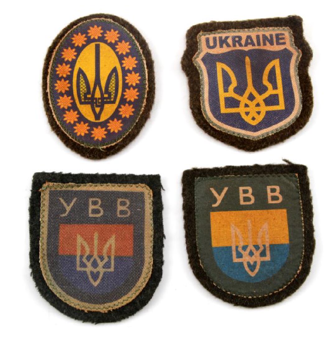 4 GERMAN WWII UKRAINIAN VOLUNTEER SLEEVE PATCH LOT: Lot of four (4) sleeve patches of the WWII Ukrainian volunteers fighting on the German side. Includes two (2) "YBB", one (1) "Ukraine"), and one (1) other. Some wear. "Unauthenticated. Sold "as is". T