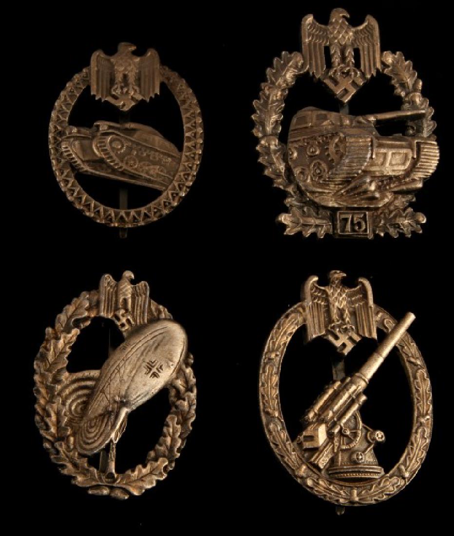 4 GERMAN WWII THIRD REICH HEER BADGE LOT: Lot of four (4) includes: Army Balloon Pilot, Anti-Aircraft, Army Tank Assault (75 actions), and tank honor badge. Makers marks on two. 180 degree pin lie on all. Unauthenticated. Sold "as is". This l
