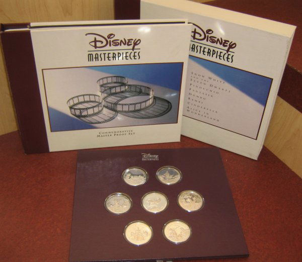 DISNEY SNOW WHITE COINS MASTER PROOF SILVER SET: Disney Masterpieces commemorative Master Proof set Volume 1 including 7 .999 Silver coins each 1 Troy OZ with certificate of authenticity contained in 118 hard cover book. Coins are: 1937 Snow White a