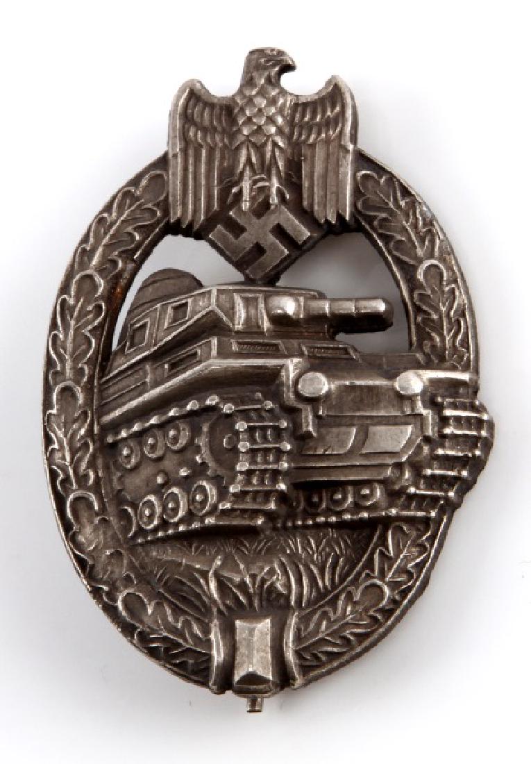 WWII GERMAN THIRD REICH PANZER ASSAULT BADGE: In very good condition. The reverse side is marked AS in a triangle. Has a thin vertical pinback with a ball suspension.