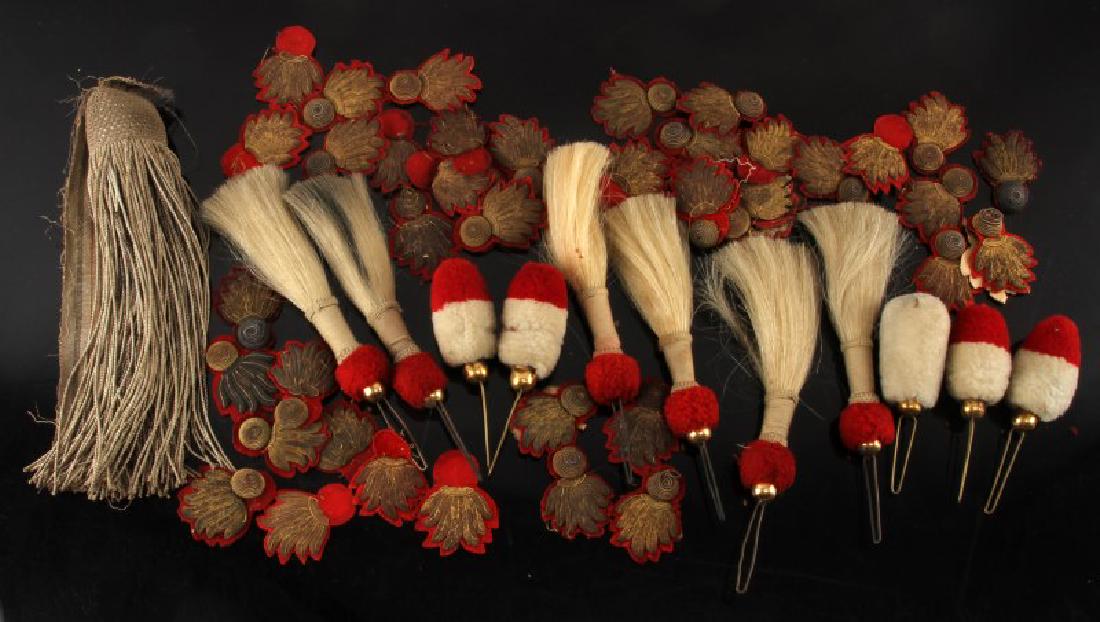U.S. INDIAN WARS ARTILLERY PLUME & PATCH LOT: Ordnance grenade bullion patches and headgear artillery plumes, also included is bullion knot end of a waist sash. FE124