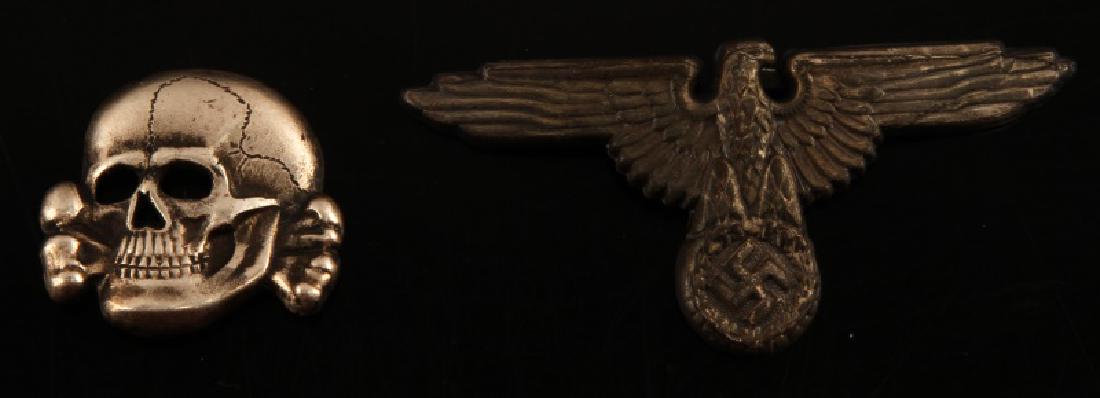 WWII GERMAN THIRD REICH SS VISOR CAP TOTENKOPF SET: Eagle has to prongs and no makers mark. Totenkopf 2 prongs and is RZM stamped with M1/52