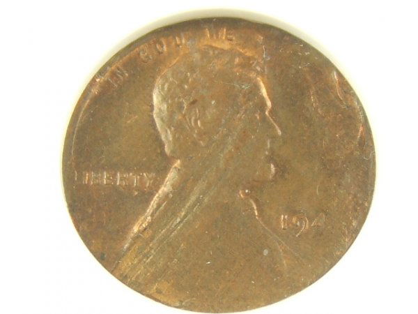 194X LINCOLN CENT MINT ERROR SPLIT PLANCHET NGC: 194X Lincoln Cent Mint Error NGC certified Split Planchet Before Strike 1.5 grams with obvious large portions of obverse and reverse affected.