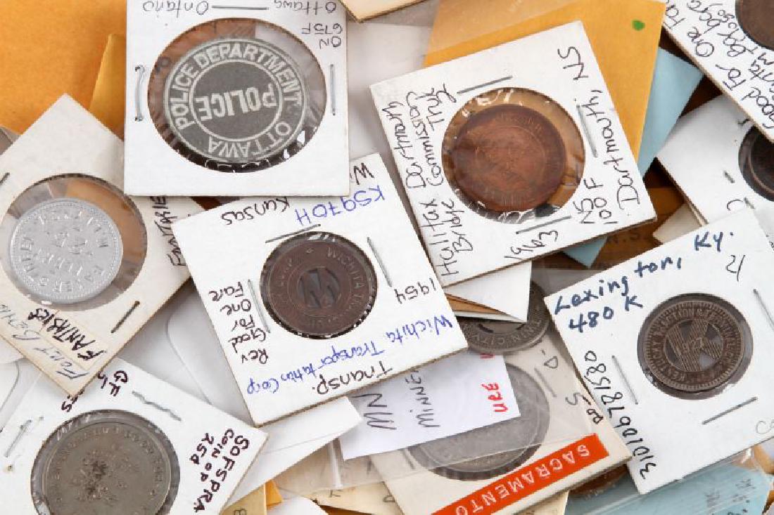 LARGE UNSEARCH TOKEN LOT FROM MULTIPLE STATES: Railway, bus, food, bridge and more from California to Florida. Noticed dates from early 1900's-1990's, unsearched. Total weight 2.7 ponds, weight includes 2 by 2 envelopes most are labeled.