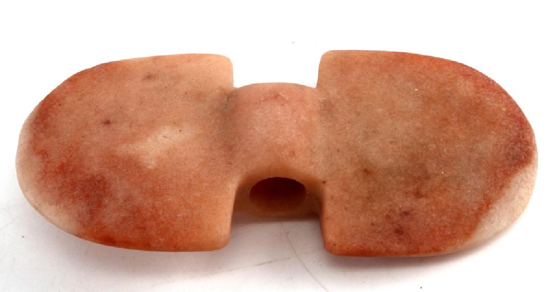 DOUBLE SIDED PINK MARBLE LITHIC TOMAHAWK BLADE: Double sided pink marble or soapstone Paleolithic axe or tomahawk blade with two individual blades faced in each direction with central tube hole for fastening onto wooden handle. The lithic stone bla