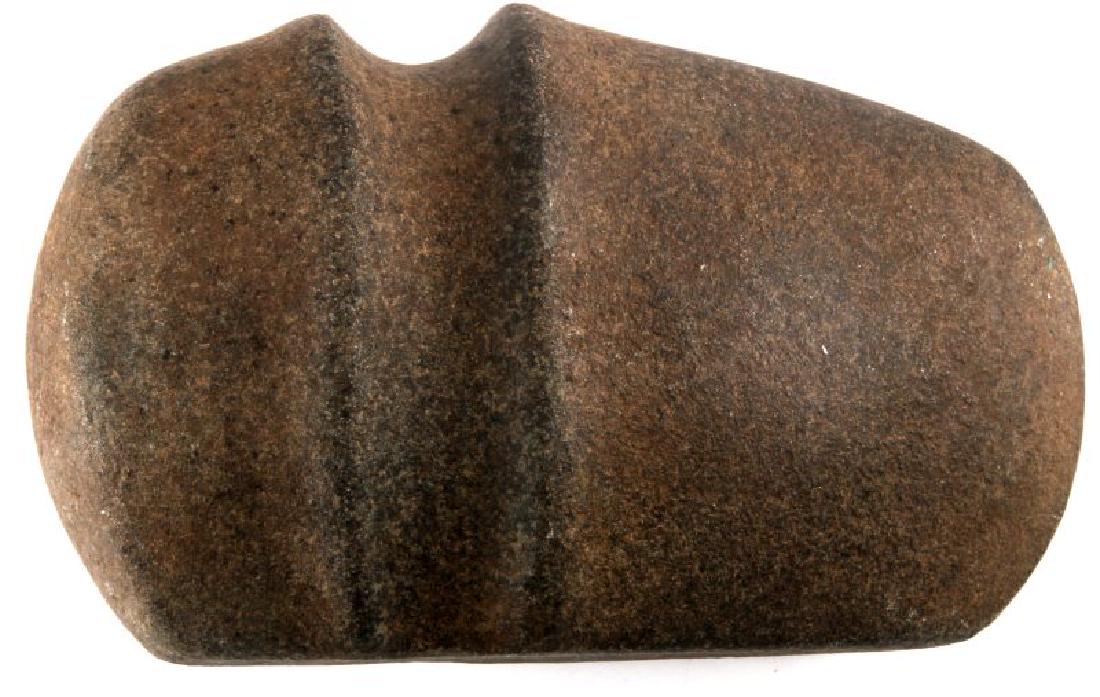 NATIVE AMERICAN HOPEWELL STONE AXE HEAD 6.5 INCH: Native American Hopewell stone axe head. 6.5" in length. Relatively smooth. Large groove measures 1 1/8" between peaks. VG condition.
