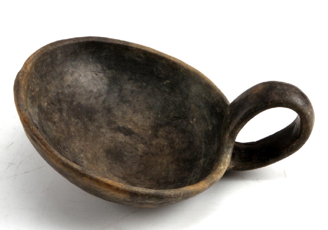 BRONZE AGE STONE DIPPING CUP ARTIFACT: Made from stone in very good condition. Does show signs of age and discoloration.