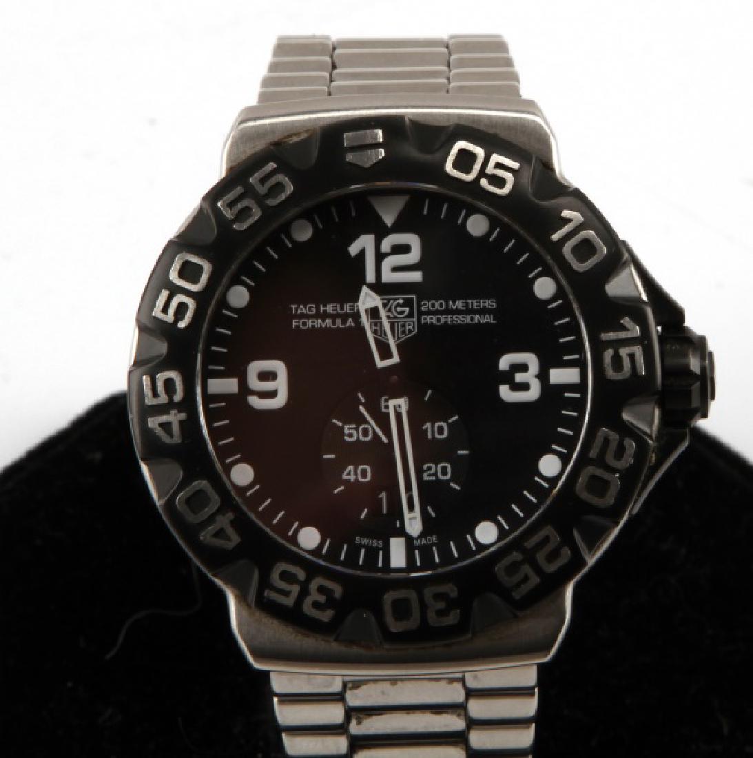 TAG HEUER MENS PROFESSIONAL WATCH WAH1010 BA0854: Men's Tag Heuer "Professional" watch. Stainless steel. Swiss made. Sapphire crystal. Water resistant to 200 meters. # WAH1010 - RAD4906. Badge marked "All stainless steel, Tag Heuer, BA0854". Approx. 
