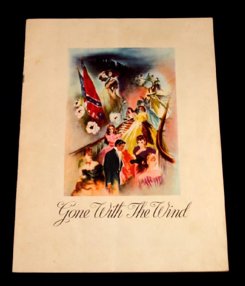 1939 ORIGINAL ISSUE GONE WITH THE WIND PROGRAM: Original 1939 Issue Gone With The Wind movie program book with color front cover image. Program measures 12 inches long by 9 inches wide. This is not the reprinted program which was released by MGM in