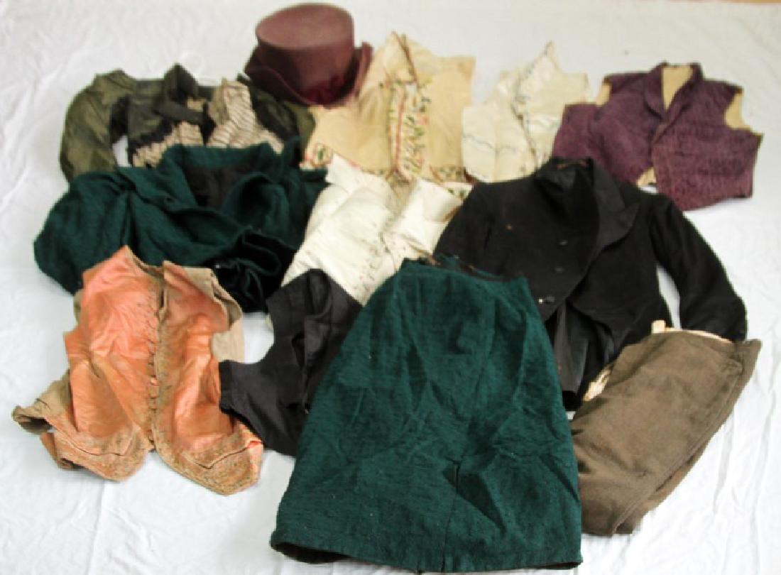 VICTORIAN AND GEORGIAN MENS AND WOMENS CLOTHING: Assorted antique clothing lot coat includes skirt, hat, bodice, pants,coat with tails, several silk embroidered vests and more. In various levels of used condition.