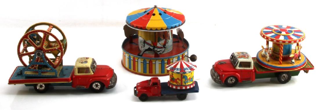 TIN LITHO CIRCUS CAR MERRY GO ROUND & FERRIS WHEEL: Lot includes Ferris Wheel with transport truck, Merry Go Round with transport truck . Lot also includes 1 mini (5 inches long) Merry go Round on truck and a 7 inch in diameter hand wind Merry go Round