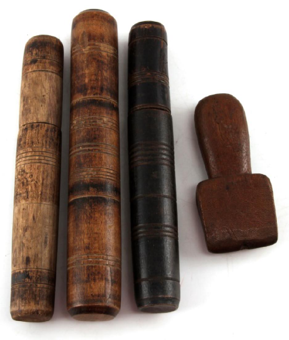 4 ANTIQUE WOODEN SAILMAKERS TOOL LOT: Lot of FOUR (4) antique wooden sail maker's tools. THREE (3) carved wood needle cases dated around the 1840s. Cases measure approximately 7 5/8 - 8 3/8 inches in length. ONE (1) 4 1/2 inch wooden seam