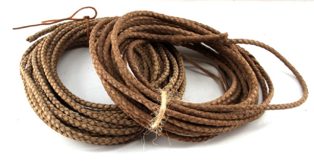 2 ANTIQUE RAWHIDE WESTERN LARIAT LASSO LOT: Each in very good useable condition, over 40 feet in length.