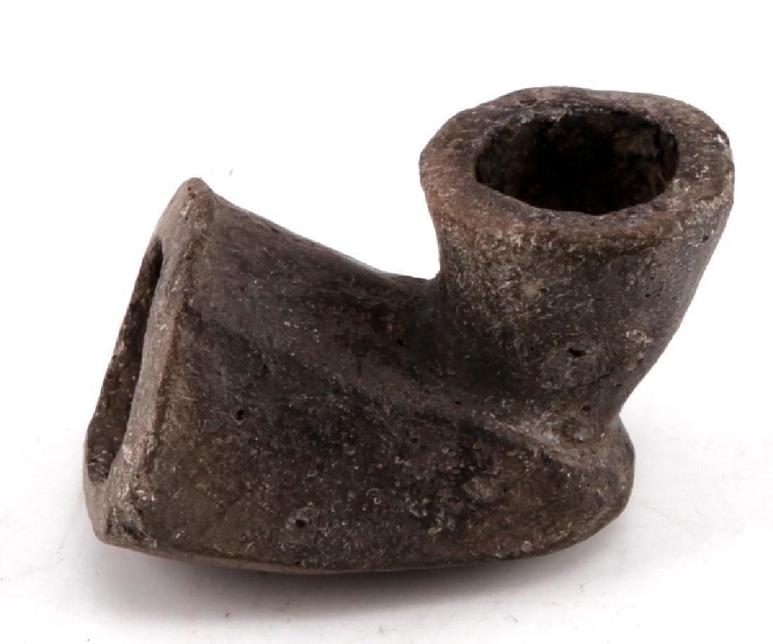 NATIVE AMERICAN ELBOW PIPE CRITTENDEN COUNTY AR: Native American elbow pipe recovered from Crittenden County, Arkansas. No cracking. Measures 2 1/2" in length, 2" in height, and 1 3/4" in width. Woodland period.
