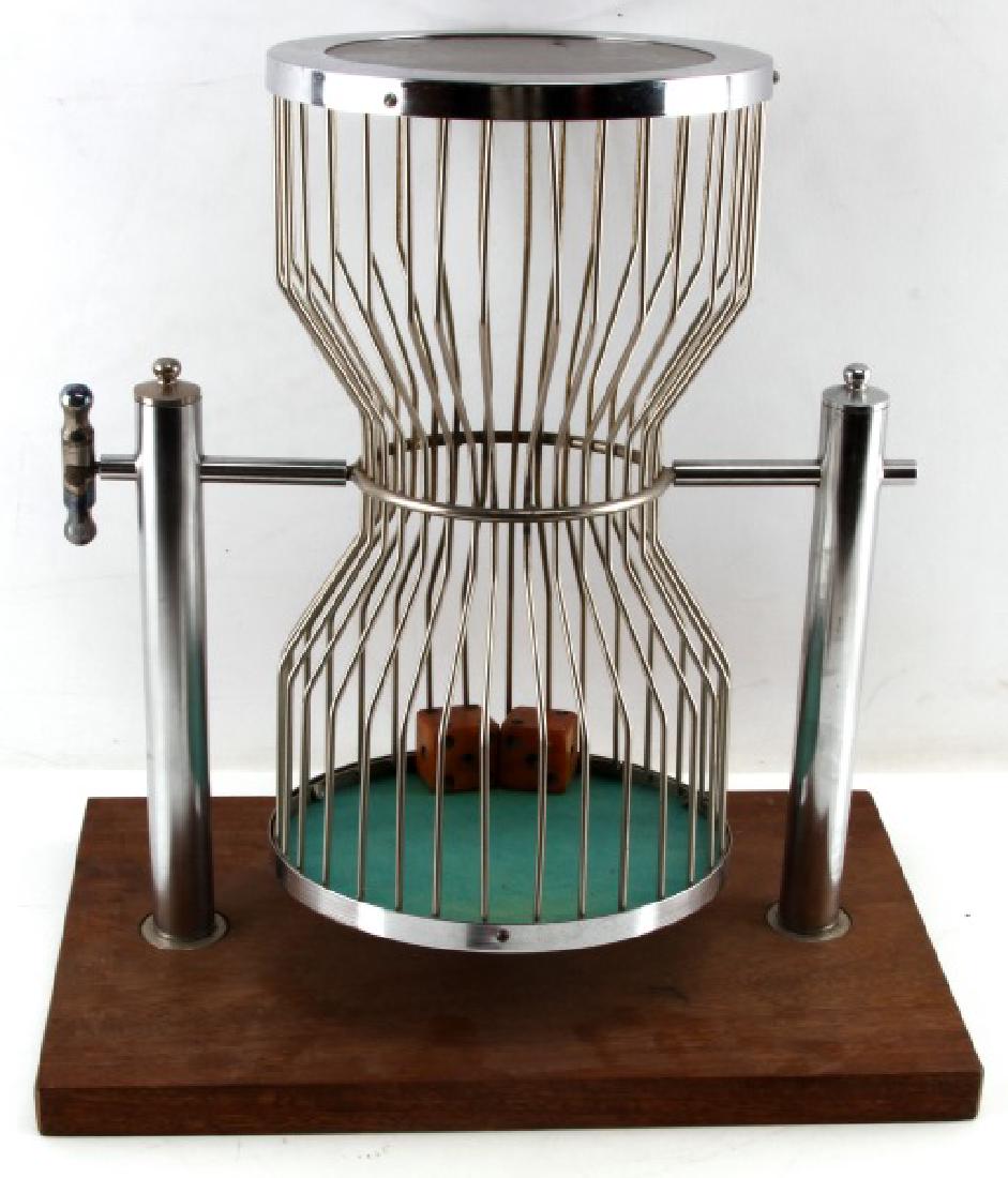 MID CENTURY CHUCK A LUCK GAMBLING DICE CAGE GAME: Vintage or older. Two (2) original dice are included. There is no bell. Measures approximately 18.5 x 17.75 inches, with 9 inch cage diameter. In very good condition throughout with some gentle age we