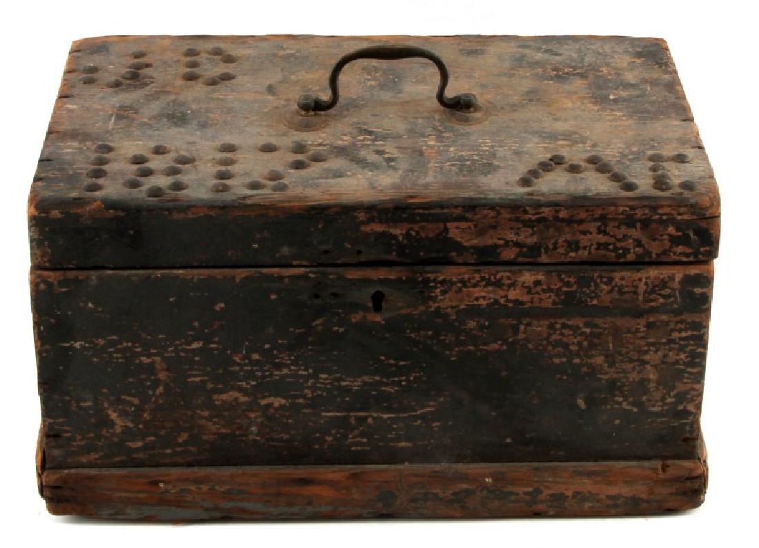 19TH CENTURY WOODEN DITTY TRINKET BOX: Dated around 1812. Hinged lid, no lock. Some wood splitting on one side. Lid studded with "JC" and "ME" initials. Heavy wear throughout. Approximate dimensions (in inches): 13 (L) x 8 (W) x 7 (T).