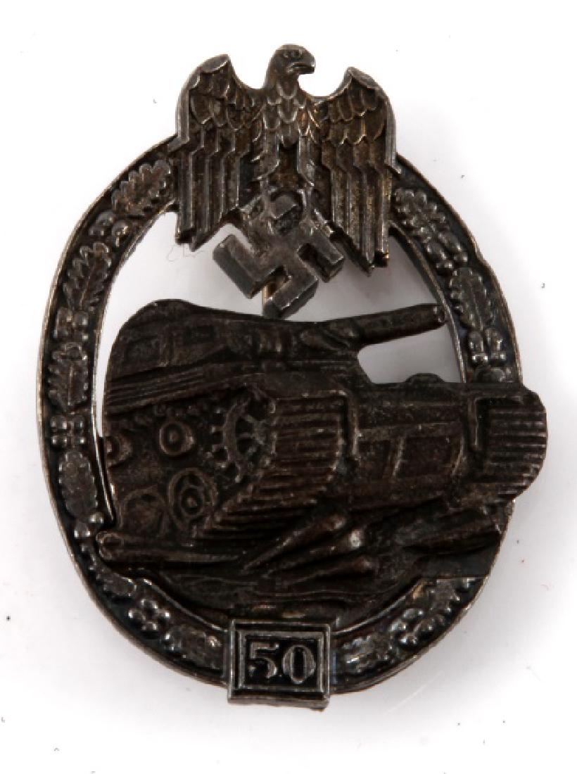 WWII GERMAN THIRD REICH PANZER 50 ASSAULT BADGE: In very good condition with some discoloration. The front is marked 50, no markings on the back. The back rivets have dug into the badge. Unauthenticated sold as is.