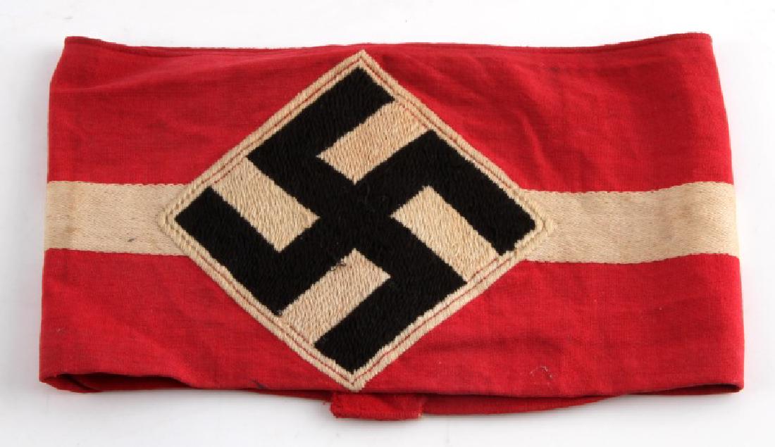 GERMAN WWII HITLER YOUTH JUGEND ARM BAND: Unmarked interior. Light soiling. Single mothing spot on reverse. Passes black light testing.