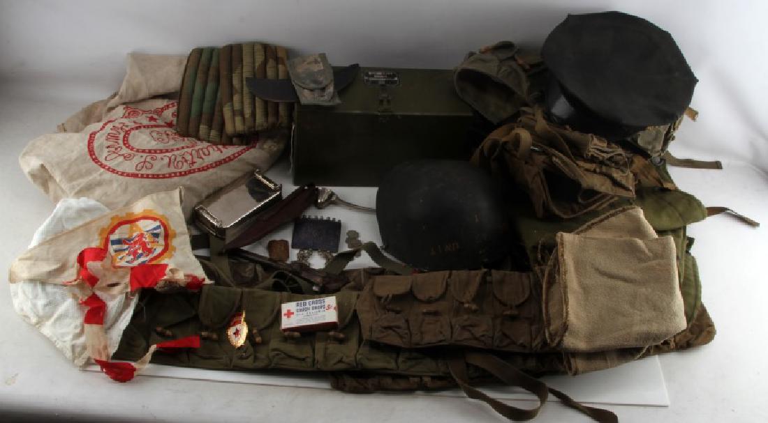 LARGE MIXED CONFLICT LOT US GERMANY RUSSIA JAPAN: Large mixed conflict lot. From the US, Germany, Russia, and Japan. Items include but are not limited to ammo belts, flags, medals, tools, and much more spanning from late 1900's to now.