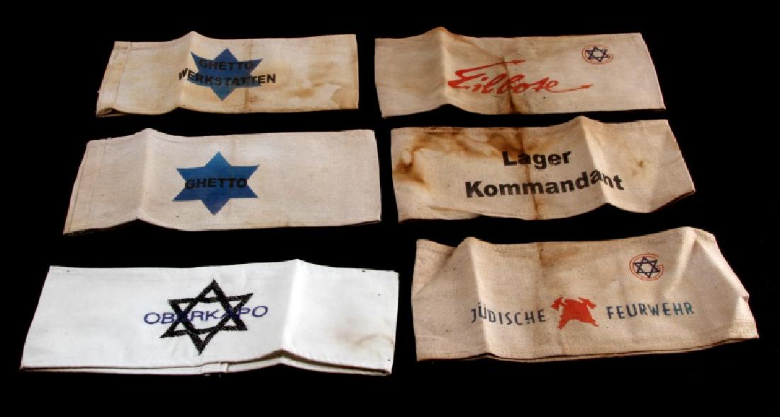6 GERMAN WWII THIRD REICH HOLOCAUST ARMBAND LOT: Lot of SIX (6) includes: Jewish fire fighter, Oberkapo, lager kommandant, ghetto, ghetto courier, and ghetto workshop. Age wear and staining present. Unauthenticated. Sold "as is". This lot has a rese