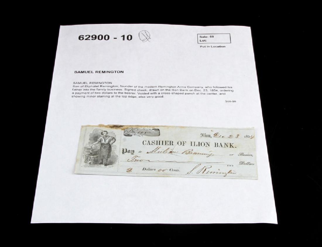 PERSONAL CHECK SIGNED BY SAMUEL REMINGTON W COA: Signed check drawn on Ilion Bank (Dec. 23, 1854). Voided with a cross-shaped punch at the center. Minor staining at top of check. Very good condition. Comes with descriptive COA from "Alexander Histor