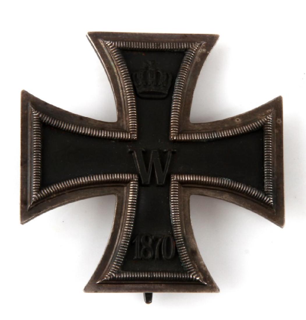 IMPERIAL GERMAN WWI 1870 IRON CROSS 1ST CLASS: Issued type with wide flat pin and uniform hooks. Slightly vaulted and uncleaned. No makers marks. This lot has a reserve.