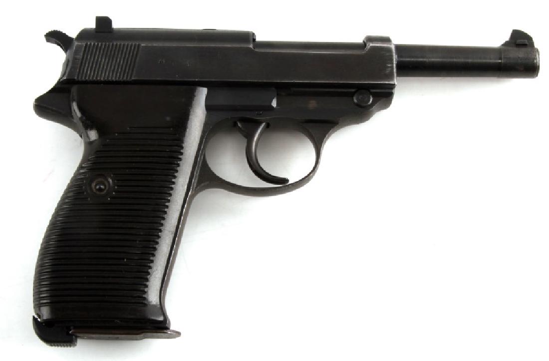 WWII GERMAN WALTHER P38 SEMI AUTO PISTOL 9MM: Spreewerk Walther P38. Blued steel retains 60% with areas of oxidation, grooved bakelite grips, markings to left side, "P38, cyq, 795 1, 795 l". Nazi eagle marks to right side. Serial no. 795 with L b