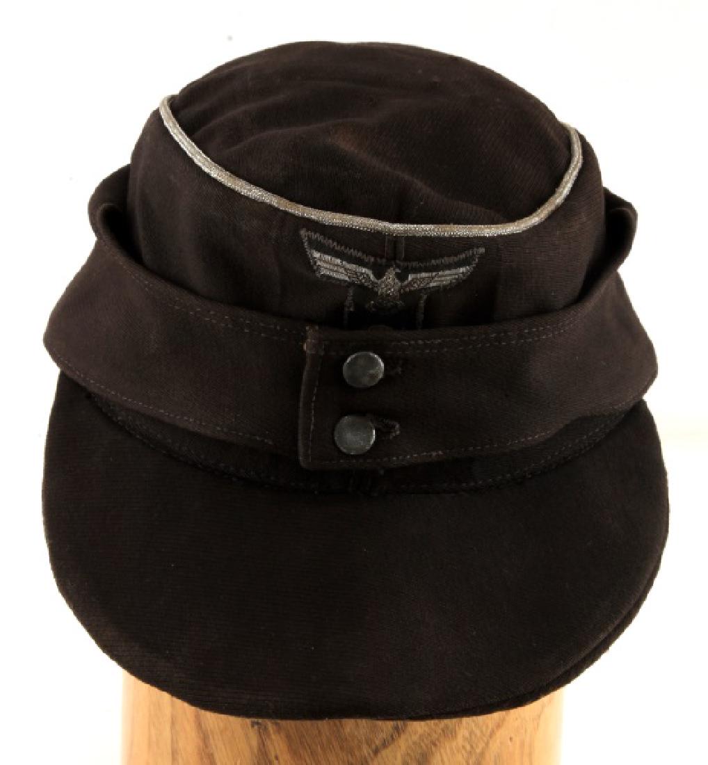 WWII GERMAN THIRD REICH PANZER OFFICER M43 CAP: Black wool M-43 cap of a panzer officer. In very good condition, with silver bullion wire. In very good condition, does not fluoresce under blacklight.