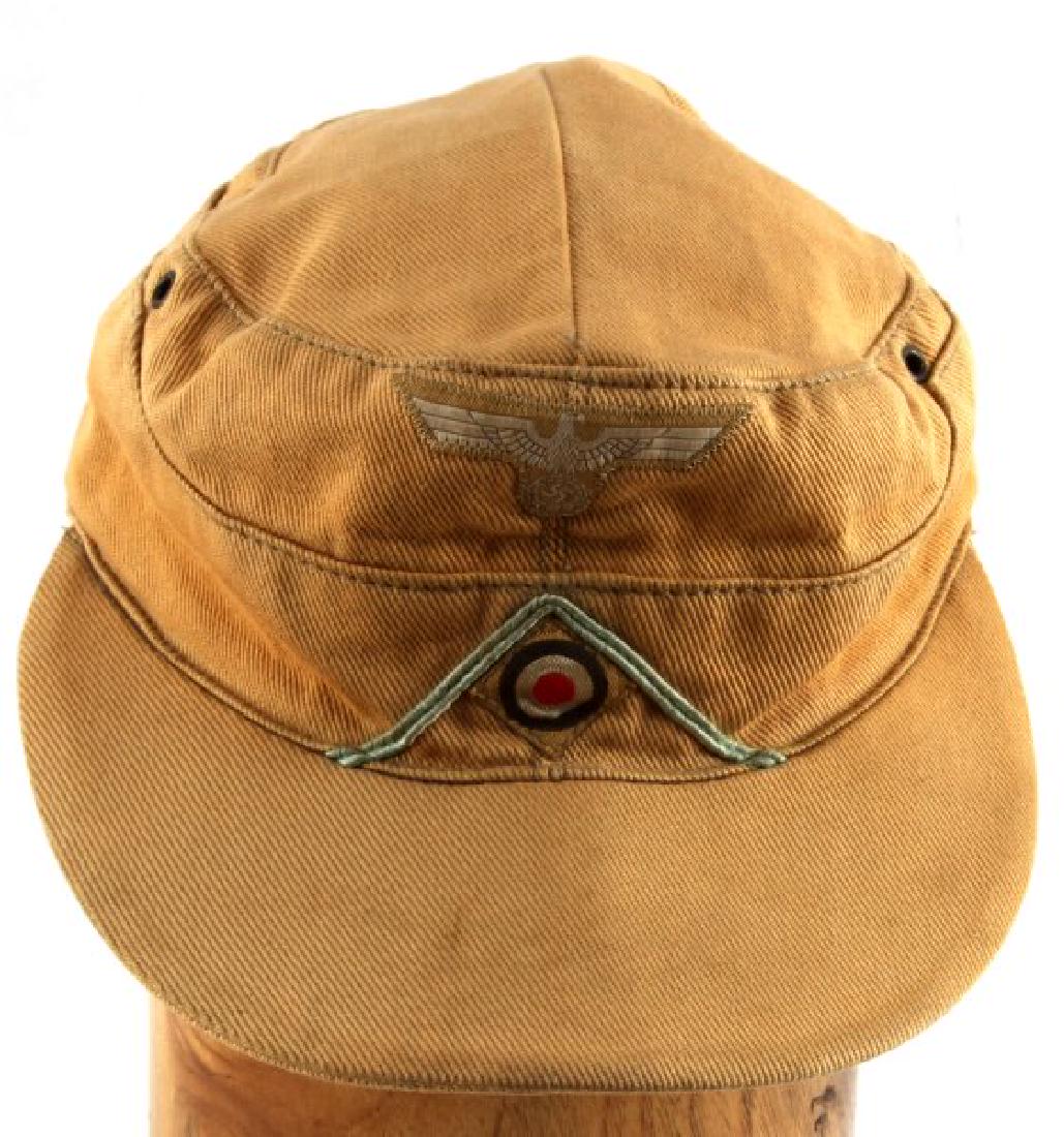 GERMAN THIRD REICH WWII AFRIKA CORPS M-43 CAP: German WWII Third Reich Afrika Corps M-43 cap. No mothing signs or tears. Wear on interior liner as expected. Passes blacklight testing. Size 60 as stamped on interior. Also stamped 1941 with maker.