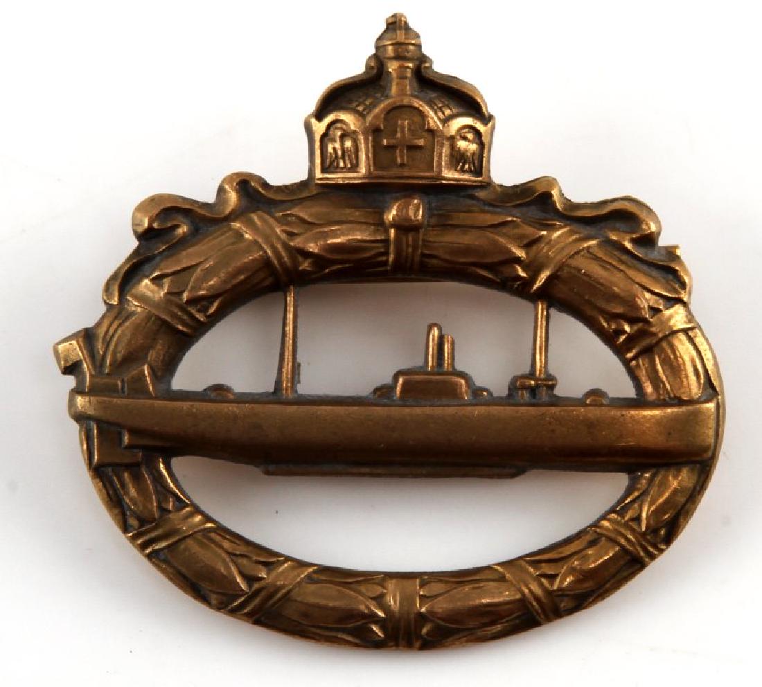 WWI IMPERIAL GERMAN NAVY U BOAT SUBMARINE BADGE: In very good condition with issue ribbon and has a straight horizontal pinback. Reverse is marked walter schott fec.
