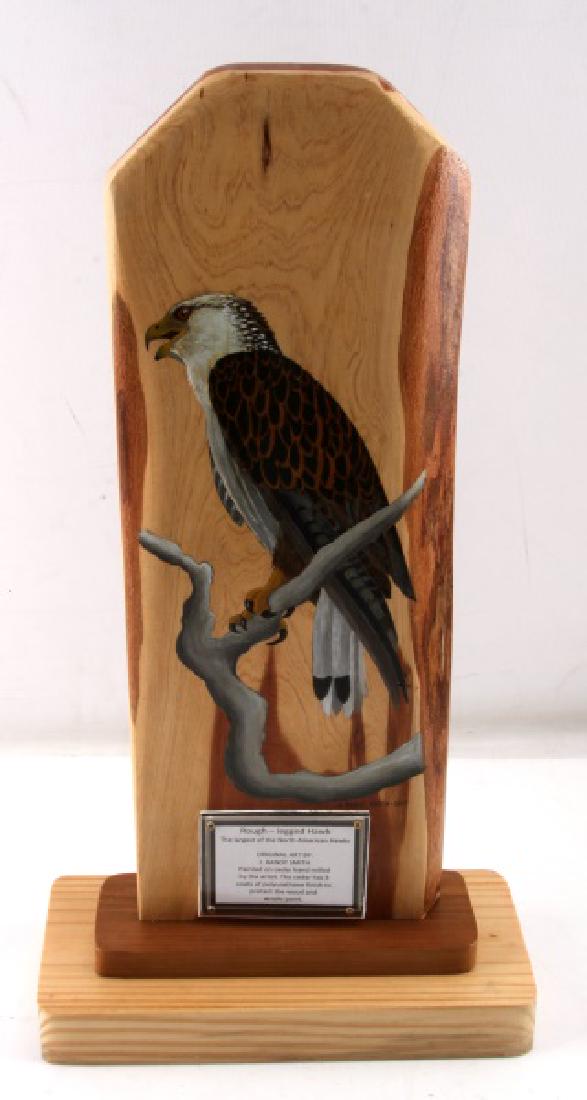 21 INCH ROUGH LEGGED HAWK ON CEDAR ART PIECE: Original art piece hand crafted and painted by local Tallahassee artist J. Randy Smith. Good, realistic detail and bold colors. Three coats of polyurethane finish added to protect paint and wood. Moun