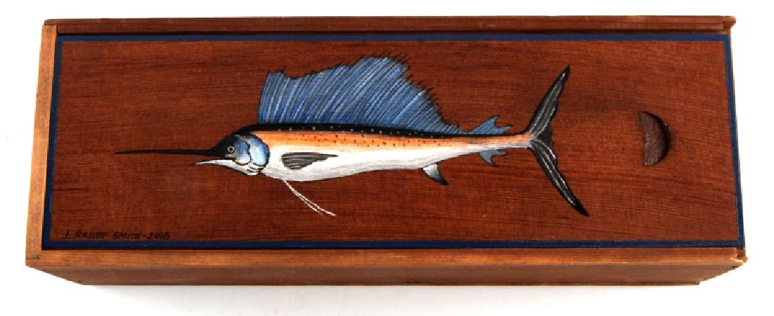 SLIDING LID HANDPAINTED WOODEN WISKEY BOX JR.SMITH: Hand Painted wooden sliding lid whiskey style box with sliding lid which is painted with blue border, with the image of a Blue - Finned Sailfish on the sliding wood lid of the box which measures 11.25